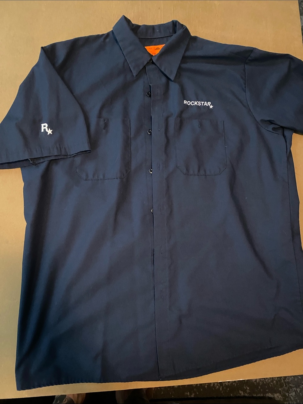 ROCKSTAR GAMES Navy Short-Sleeve Work Shirt
Embroidered logo on right sleeve